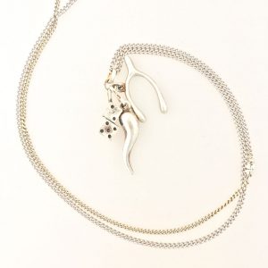 Lucky Charm Necklace #1 is made from vintage sterling silver chain and three vintage sterling silver charms with symbols that are supposed to bring luck.