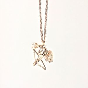 Lucky Necklace #3 is made from vintage sterling silver chain and three vintage sterling silver charms
